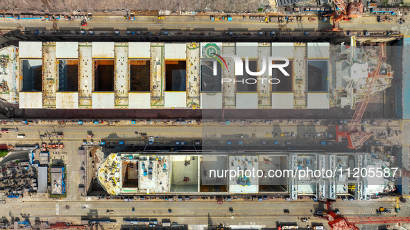 Workers are repairing ships in Zhoushan, China, on May 3, 2024. 