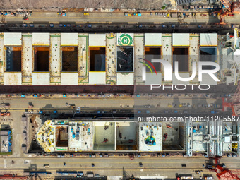 Workers are repairing ships in Zhoushan, China, on May 3, 2024. (