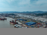 Workers are repairing ships in Zhoushan, China, on May 3, 2024. (