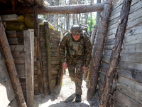 In Kharkiv Region, Ukraine, on May 3, 2024, Oleksii, who goes by the call sign Shershen (Hornet), is serving as a marksman and medic for the...