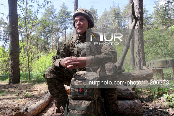 In Kharkiv Region, Ukraine, on May 3, 2024, Oleksii, who goes by the call sign Shershen (Hornet), is serving as a marksman and medic for the...