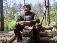 In Kharkiv Region, Ukraine, on May 3, 2024, Oleksii, who goes by the call sign Shershen (Hornet), is serving as a marksman and medic for the...