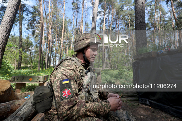 In Kharkiv Region, Ukraine, on May 3, 2024, Oleksii, who goes by the call sign Shershen (Hornet), is serving as a marksman and medic for the...