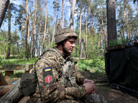 In Kharkiv Region, Ukraine, on May 3, 2024, Oleksii, who goes by the call sign Shershen (Hornet), is serving as a marksman and medic for the...