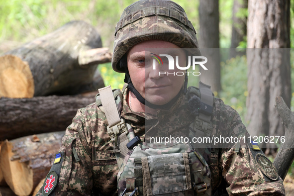 In Kharkiv Region, Ukraine, on May 3, 2024, Oleksii, who goes by the call sign Shershen (Hornet), is serving as a marksman and medic for the...