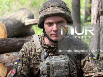 In Kharkiv Region, Ukraine, on May 3, 2024, Oleksii, who goes by the call sign Shershen (Hornet), is serving as a marksman and medic for the...