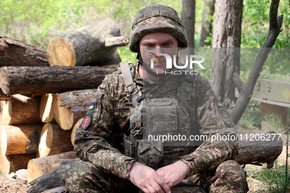 In Kharkiv Region, Ukraine, on May 3, 2024, Oleksii, who goes by the call sign Shershen (Hornet), is serving as a marksman and medic for the...