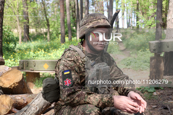 In Kharkiv Region, Ukraine, on May 3, 2024, Oleksii, who goes by the call sign Shershen (Hornet), is serving as a marksman and medic for the...