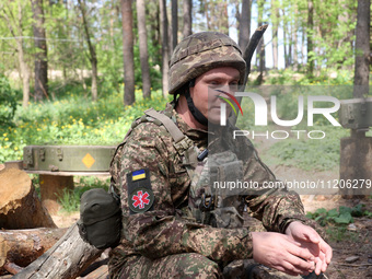 In Kharkiv Region, Ukraine, on May 3, 2024, Oleksii, who goes by the call sign Shershen (Hornet), is serving as a marksman and medic for the...