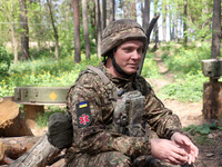 In Kharkiv Region, Ukraine, on May 3, 2024, Oleksii, who goes by the call sign Shershen (Hornet), is serving as a marksman and medic for the...