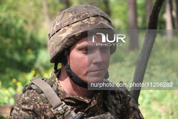 In Kharkiv Region, Ukraine, on May 3, 2024, Oleksii, who goes by the call sign Shershen (Hornet), is serving as a marksman and medic for the...