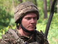 In Kharkiv Region, Ukraine, on May 3, 2024, Oleksii, who goes by the call sign Shershen (Hornet), is serving as a marksman and medic for the...