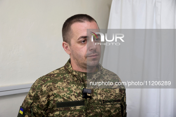 A military doctor of the 5th Slobozhanska Brigade of the National Guard of Ukraine, known by his call sign Morfin (Morphine), is providing m...