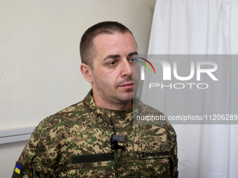 A military doctor of the 5th Slobozhanska Brigade of the National Guard of Ukraine, known by his call sign Morfin (Morphine), is providing m...