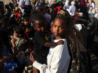 Displaced Palestinians are attending a mass wedding ceremony in Khan Yunis, in the southern Gaza Strip, on May 3, 2024, amid the ongoing con...