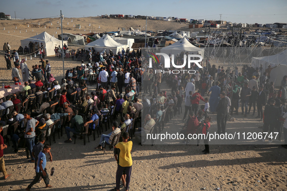 Displaced Palestinians are attending a mass wedding ceremony in Khan Yunis, in the southern Gaza Strip, on May 3, 2024, amid the ongoing con...