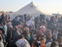 Displaced Palestinians are attending a mass wedding ceremony in Khan Yunis, in the southern Gaza Strip, on May 3, 2024, amid the ongoing con...