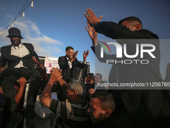 Displaced Palestinians are attending a mass wedding ceremony in Khan Yunis, in the southern Gaza Strip, on May 3, 2024, amid the ongoing con...