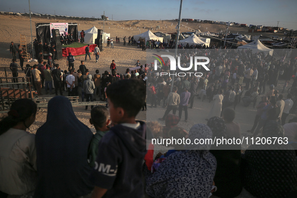 Displaced Palestinians are attending a mass wedding ceremony in Khan Yunis, in the southern Gaza Strip, on May 3, 2024, amid the ongoing con...