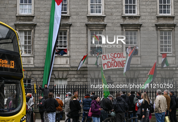 DUBLIN, IRELAND - MAY 4:
Trinity College Dublin windows occupied by students in Keffiyeh and face masks, waving Palestinian flags, on May 4,...