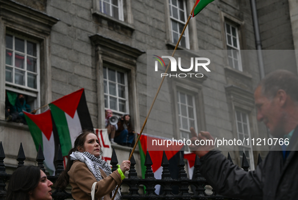 DUBLIN, IRELAND - MAY 4:
Pro-Palestinian activists gather outside Trinity College Dublin in solidarity with student protests inside, reaffir...