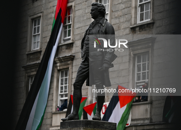 DUBLIN, IRELAND - MAY 4:
Trinity College Dublin windows occupied by students in Keffiyeh and face masks, waving Palestinian flags, on May 4,...