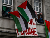 DUBLIN, IRELAND - MAY 4:
Trinity College Dublin windows occupied by students in Keffiyeh and face masks, waving Palestinian flags, on May 4,...