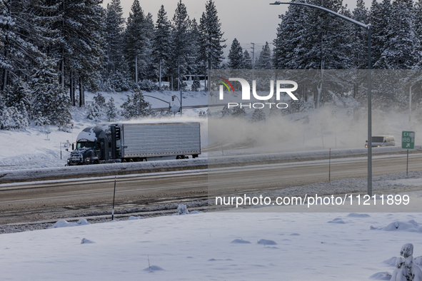 Interstate 80 is reopening following a rare May blizzard in Truckee, California, on May 5, 2024. The Western US storm is bringing rain and o...