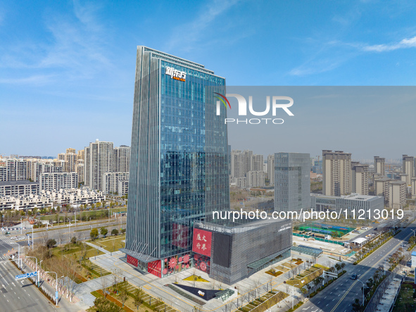 An aerial view of the Anhui headquarters building of New Oriental is being captured in Hefei, Anhui Province, China, on February 14, 2024. 