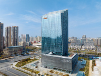 An aerial view of the Anhui headquarters building of New Oriental is being captured in Hefei, Anhui Province, China, on February 14, 2024. (