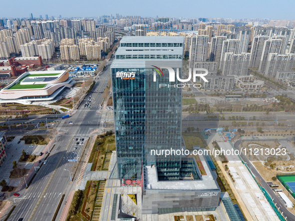 An aerial view of the Anhui headquarters building of New Oriental is being captured in Hefei, Anhui Province, China, on February 14, 2024. 