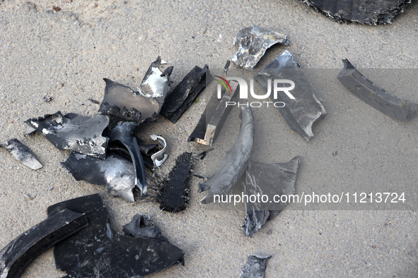 Pieces of metal are arranged on the ground following Russian shelling in Kharkiv, northeastern Ukraine, on May 5, 2024. NO USE RUSSIA. NO US...