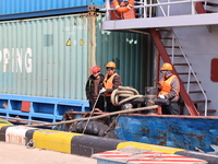 A worker is operating a machine at Taicang Port and the International Port to remove pollutants in Suzhou, Jiangsu Province, China, on March...