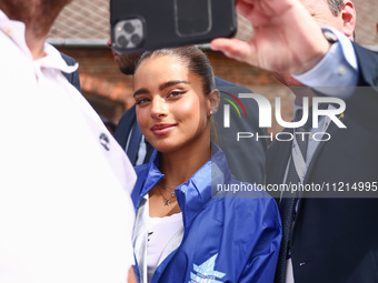 Participants take pictures with Noa Kirel, Israeli singer and actress, while attending the 36th anniversary of 'International March of the L...