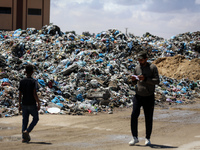 Piles of garbage are accumulating in Khan Yunis, in the southern Gaza Strip, amid the ongoing conflict between Israel and Hamas, on May 6, 2...