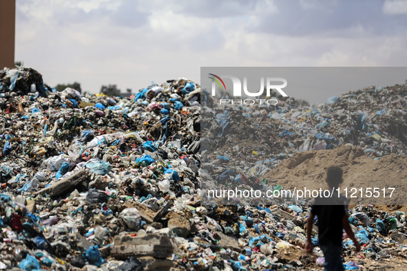 Piles of garbage are accumulating in Khan Yunis, in the southern Gaza Strip, amid the ongoing conflict between Israel and Hamas, on May 6, 2...