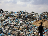 Piles of garbage are accumulating in Khan Yunis, in the southern Gaza Strip, amid the ongoing conflict between Israel and Hamas, on May 6, 2...