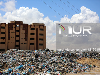 Piles of garbage are accumulating in Khan Yunis, in the southern Gaza Strip, amid the ongoing conflict between Israel and Hamas, on May 6, 2...