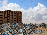 Piles of garbage are accumulating in Khan Yunis, in the southern Gaza Strip, amid the ongoing conflict between Israel and Hamas, on May 6, 2...