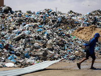 Piles of garbage are accumulating in Khan Yunis, in the southern Gaza Strip, amid the ongoing conflict between Israel and Hamas, on May 6, 2...