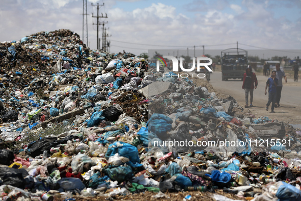 Piles of garbage are accumulating in Khan Yunis, in the southern Gaza Strip, amid the ongoing conflict between Israel and Hamas, on May 6, 2...