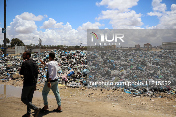 Piles of garbage are accumulating in Khan Yunis, in the southern Gaza Strip, amid the ongoing conflict between Israel and Hamas, on May 6, 2...