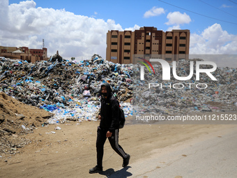 Piles of garbage are accumulating in Khan Yunis, in the southern Gaza Strip, amid the ongoing conflict between Israel and Hamas, on May 6, 2...