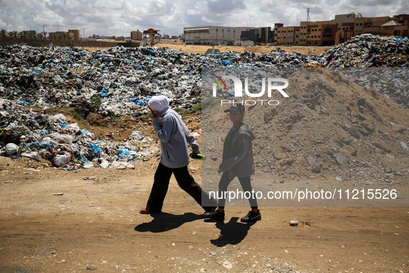 Piles of garbage are accumulating in Khan Yunis, in the southern Gaza Strip, amid the ongoing conflict between Israel and Hamas, on May 6, 2...