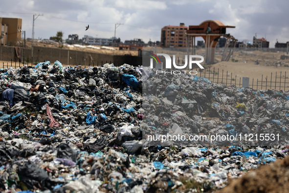 Piles of garbage are accumulating in Khan Yunis, in the southern Gaza Strip, amid the ongoing conflict between Israel and Hamas, on May 6, 2...