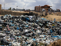 Piles of garbage are accumulating in Khan Yunis, in the southern Gaza Strip, amid the ongoing conflict between Israel and Hamas, on May 6, 2...