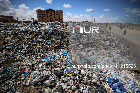 Piles of garbage are accumulating in Khan Yunis, in the southern Gaza Strip, amid the ongoing conflict between Israel and Hamas, on May 6, 2...