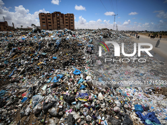 Piles of garbage are accumulating in Khan Yunis, in the southern Gaza Strip, amid the ongoing conflict between Israel and Hamas, on May 6, 2...