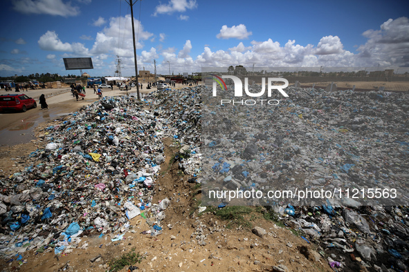 Piles of garbage are accumulating in Khan Yunis, in the southern Gaza Strip, amid the ongoing conflict between Israel and Hamas, on May 6, 2...