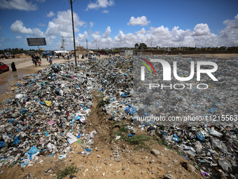 Piles of garbage are accumulating in Khan Yunis, in the southern Gaza Strip, amid the ongoing conflict between Israel and Hamas, on May 6, 2...